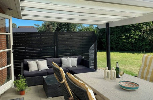 Grena Strand House | Modern holiday home with spa at Grenaa Beach