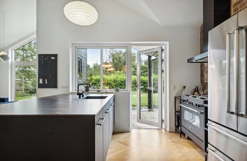 Elsegarde Strand House | Modern home close to Hjelm Deep