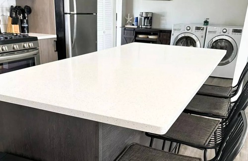 Lincoln House | Modern Home near downtown and UNL with Firepit, BBQ Grill & Air Hockey!