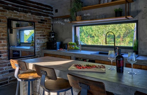 Petrinja House | Modern home with jacuzzi and sauna near the Kupa River for relaxation.