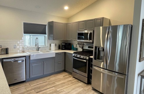 Villa St. Simons House | Modern home with no carpet, private hot tub, fire pit, golf cart, and BBQ!