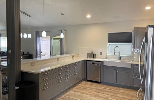 Villa St. Simons House | Modern home with no carpet, private hot tub, fire pit, golf cart, and BBQ!