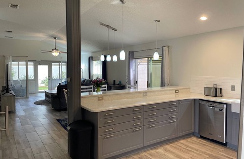 Villa St. Simons House | Modern home with no carpet, private hot tub, fire pit, golf cart, and BBQ!