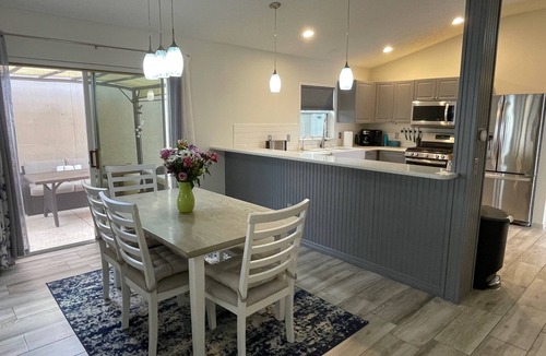 Villa St. Simons House | Modern home with no carpet, private hot tub, fire pit, golf cart, and BBQ!