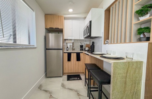Pembroke Pines Apartment | Modern King Suite Cozy Sofa Bed Near Everything