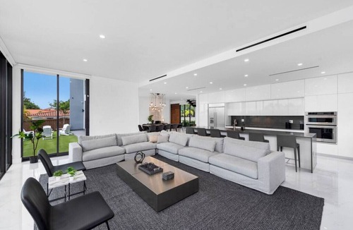Glenvar Heights Villa | Modern Lakefront Villa w/Pool, Jacuzzi and Gym