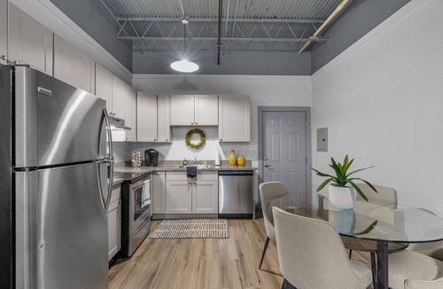 Baytown Apartment | Modern Loft Vibes Exposed Brick + Cozy Design