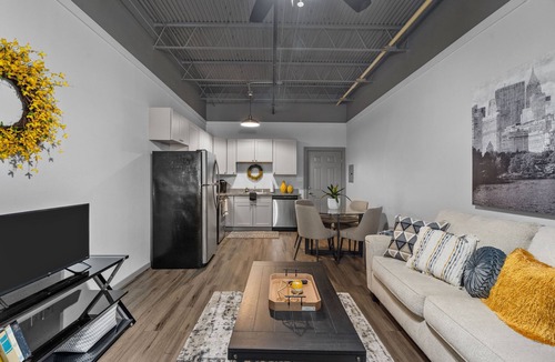 Baytown Apartment | Modern Loft Vibes Exposed Brick + Cozy Design