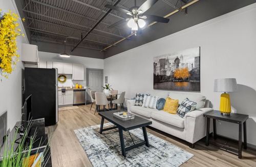 Baytown Apartment | Modern Loft Vibes Exposed Brick + Cozy Design
