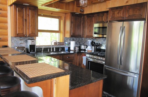 Wells Ski Chalet | Modern Log Home with 70 feet of lakefront! Great Fishing and Swimming!