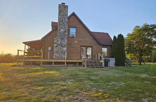 Winchester House | Modern Log House First Level Primary