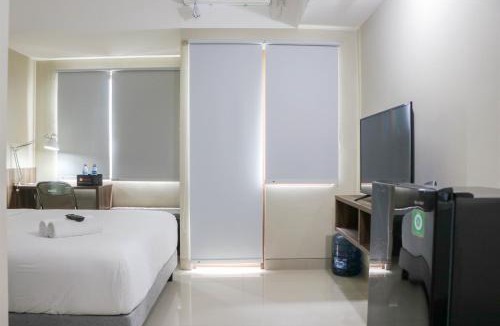 Duren Sawit Apartment | Modern Look and Homey Studio Apartment Gateway Park LRT City Jatibening By Travelio