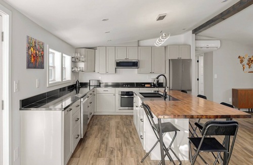 Newport House | Modern Luxe: Starlink, Heated Floors, EV Charging