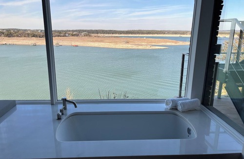 Buffalo Gap House | Modern Midcentury Lakefront with pool, hot tub, & private boat dock/Boat rentals