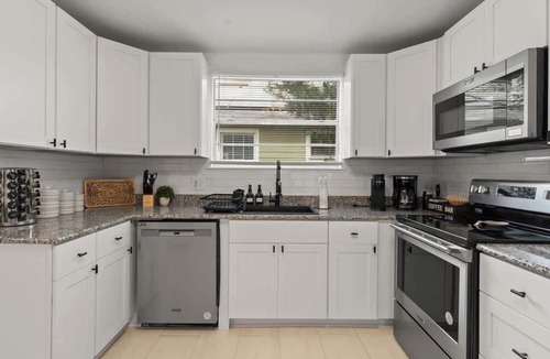 South Seminole Heights House | Modern Moroccan Villa w Firepit BBQ and Game Room!