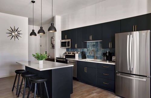 Edgehill Condo | Modern Music Row Condo with King & Queen Bedrooms + Private Balcony, Pool & Fitness Center, Walk to RCA Studio B & Local Dining, Under 2 miles to Broadway, Garage Parking, Elevator Access, 24 Hr Hospitality