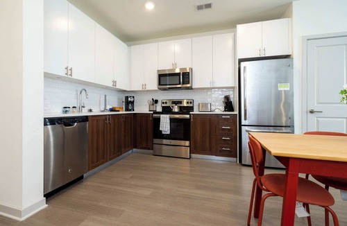 Downtown Louisville Apartment | Modern Nulu 2BR CozySuites 10