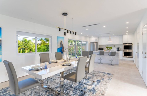 Imperial Point House | Modern Oasis, Heated Pool, Short Drive to Beach