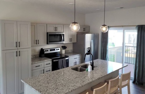 Elkhorn House | Modern Omaha Getaway with Private Deck & Free Parking
