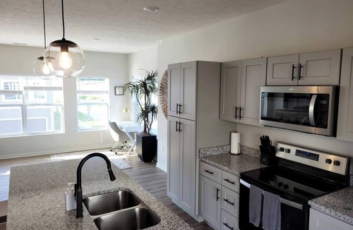 Elkhorn House | Modern Omaha Getaway with Private Deck & Free Parking