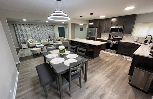 Wheaton House | Modern Open Concept Home with Pool Table by Train Station