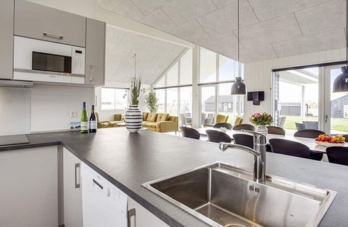 Marup House | Modern pool and activity house with jacuzzi, sauna, wifi and fireplace