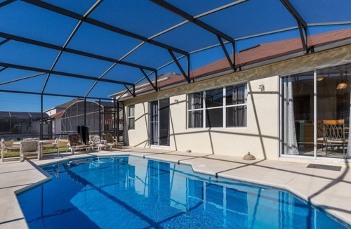 Windwood Bay House | Modern pool home with Game Room, 2 en suites and just 15 minutes to Theme Parks!