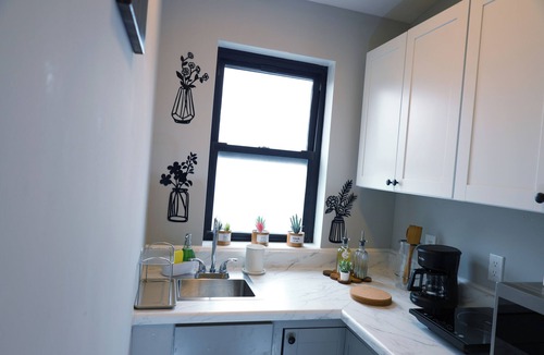 Englewood Apartment | Modern Private Red Bedroom