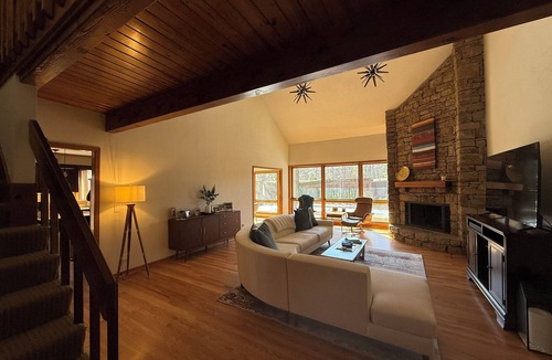 Overland Park House | Modern Resort-Style Home w/Pool, Sauna, Projection TV, & Fast Access to Stadiums