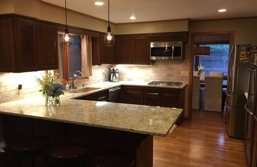 Overland Park House | Modern Resort-Style Home w/Pool, Sauna, Projection TV, & Fast Access to Stadiums