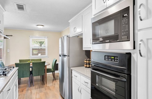 Bedford House | Modern Retreat with Pool, Hot Tub & Game Room