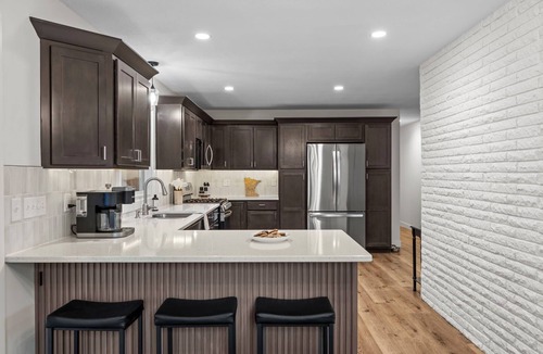 Minnetonka House | Modern Retreat with Game Porch & Fenced Yard