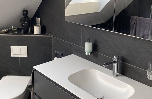 Cham Apartment | Modern roof flat in Zug / Modern roof flat in Zug