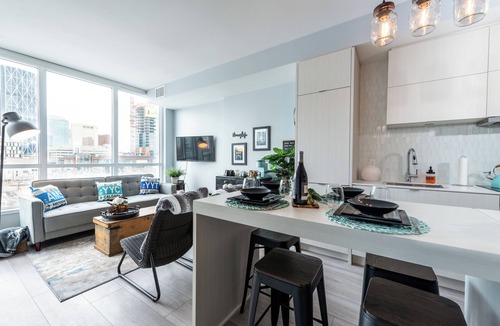 East Village House | Modern Rustic Hometel | 2BR 1BA | Smart home in DT