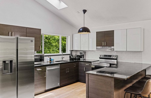 Bushkill House | Modern Stream-front property with hot tub.