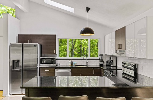 Bushkill House | Modern Stream-front property with hot tub.