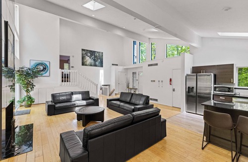 Bushkill House | Modern Stream-front property with hot tub.