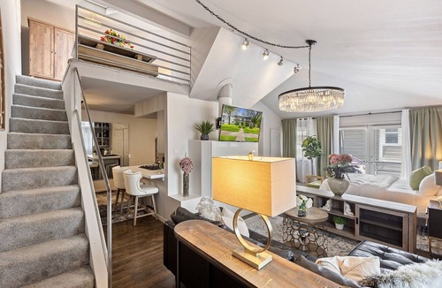 Old East Dallas Condo | Modern & Stylish 2BR/1BA loft in Dallas’ Historic Deep Ellum/Junius Heights District. Features king & queen beds, private balcony, and access to an offsite award-winning courtyard retreat.