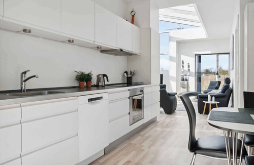 Frolunde House | Modern summer house with fantastic skylight
