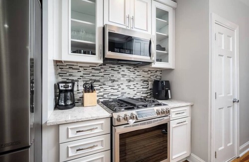 Near Northeast House | Modern Swanky Oasis Central Location FREE Parking!