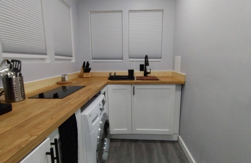 Glen Burnie Apartment | Modern Tiny Home with Pool Getaway