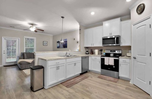 Pooler Condo | Modern Townhome in Pooler | Pool & Trails