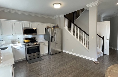 Elgin House | Modern Townhome with a theater room & gym area