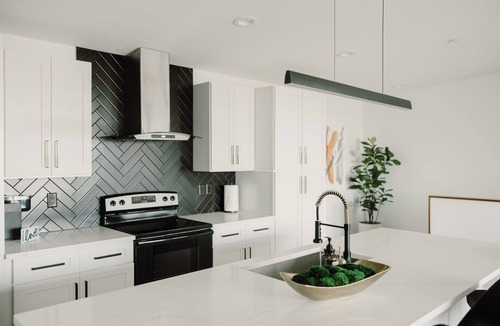 Des Moines House | Modern Townhome with Skyline Views, Heated Balcony & Curated Art in Downtown DSM