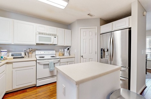 Nashboro Village House | Modern townhome with on-site golf & pool - water views, W/D, & central AC