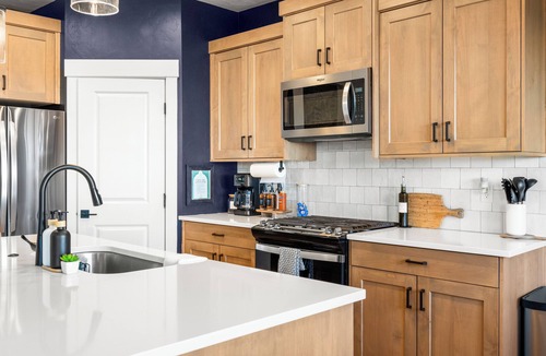 Southwest Ada County Alliance House | Modern - Turf Backyard - Stocked Kitchen