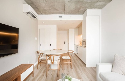 Downtown Montreal Apartment | Modern Urban Retreat with Skyline Panorama