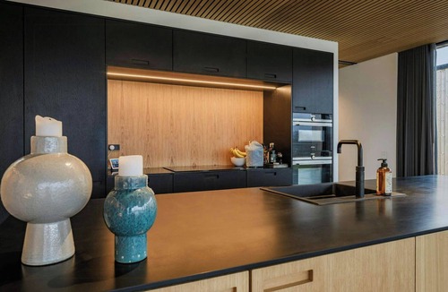 Ry House | Modern villa by Knudsø with jetty