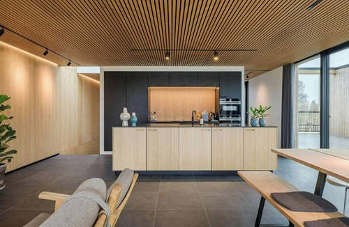 Ry House | Modern villa by Knudsø with jetty