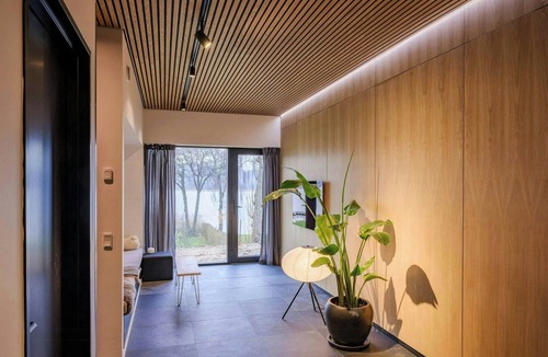 Ry House | Modern villa by Knudsø with jetty